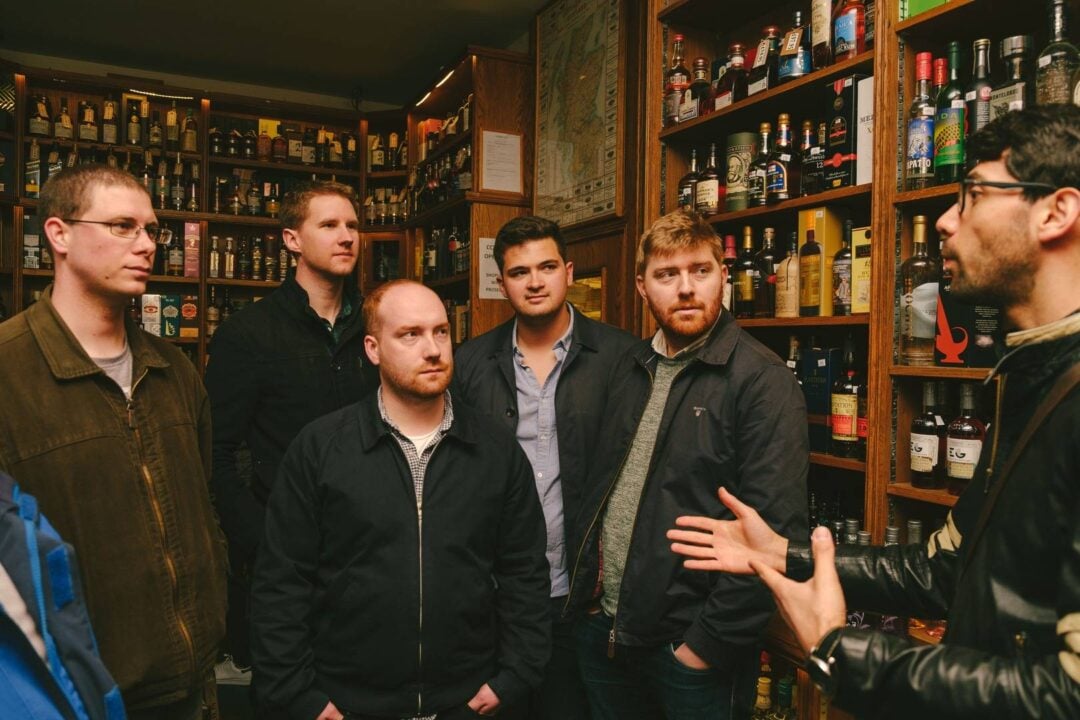 A group of friends enjoying a whisky-tasting tour in Edinburgh.,© Once Upon a Whisky