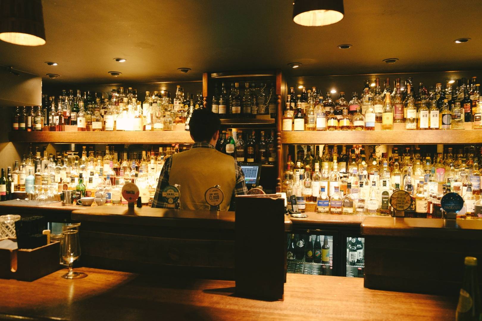 A whisky bar in Edinburgh displaying several bottles,© Once Upon a Whisky