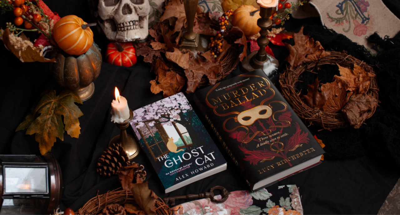 The Ghost Cat Book by Alex Howard and Murder Ballad book by Lucy Ribchester with Halloween decorated table