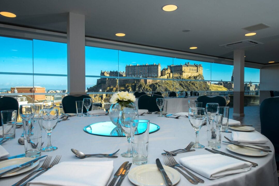 SKYbar table setting with view of Castle and Edinburgh skyline