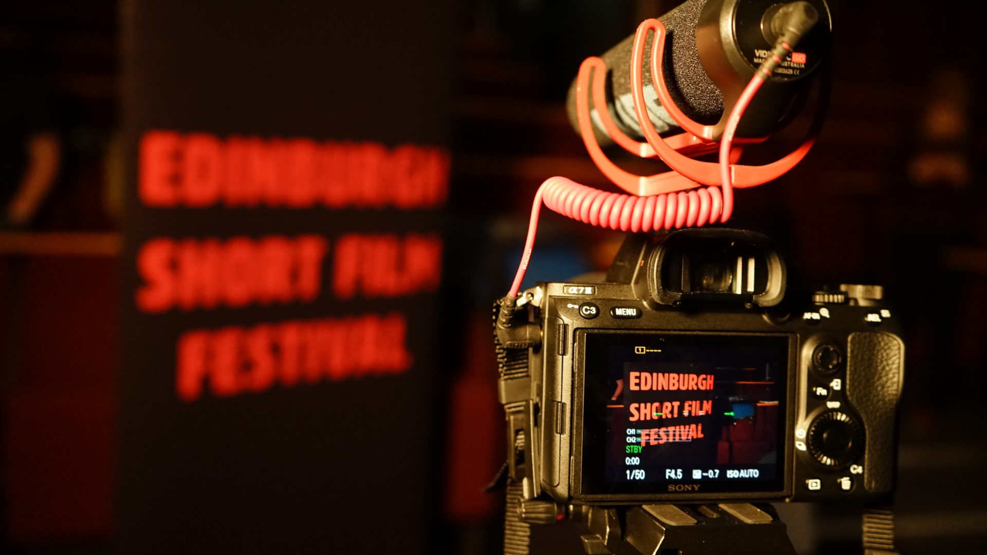 Camera and banner saying Edinburgh Short Film Festival