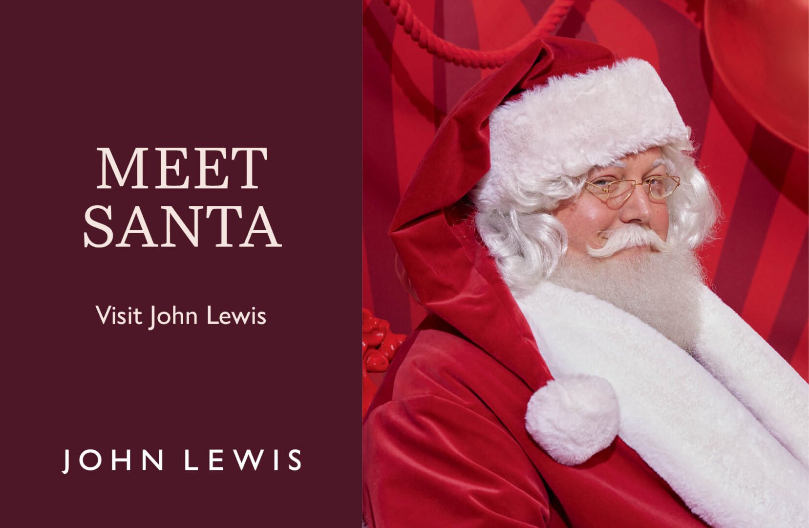 Side profile of man dressed as Santa, with red and white coat and hat with pompom.