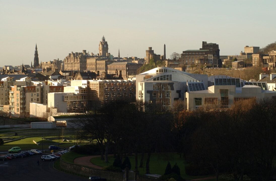 A long range view of Edinburgh from the west showing the Parliament, Nelson Monument, Scott Monument, the Balmoral clock etc