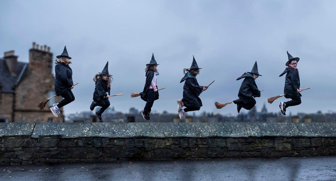 Wizards and witches on broomsticks