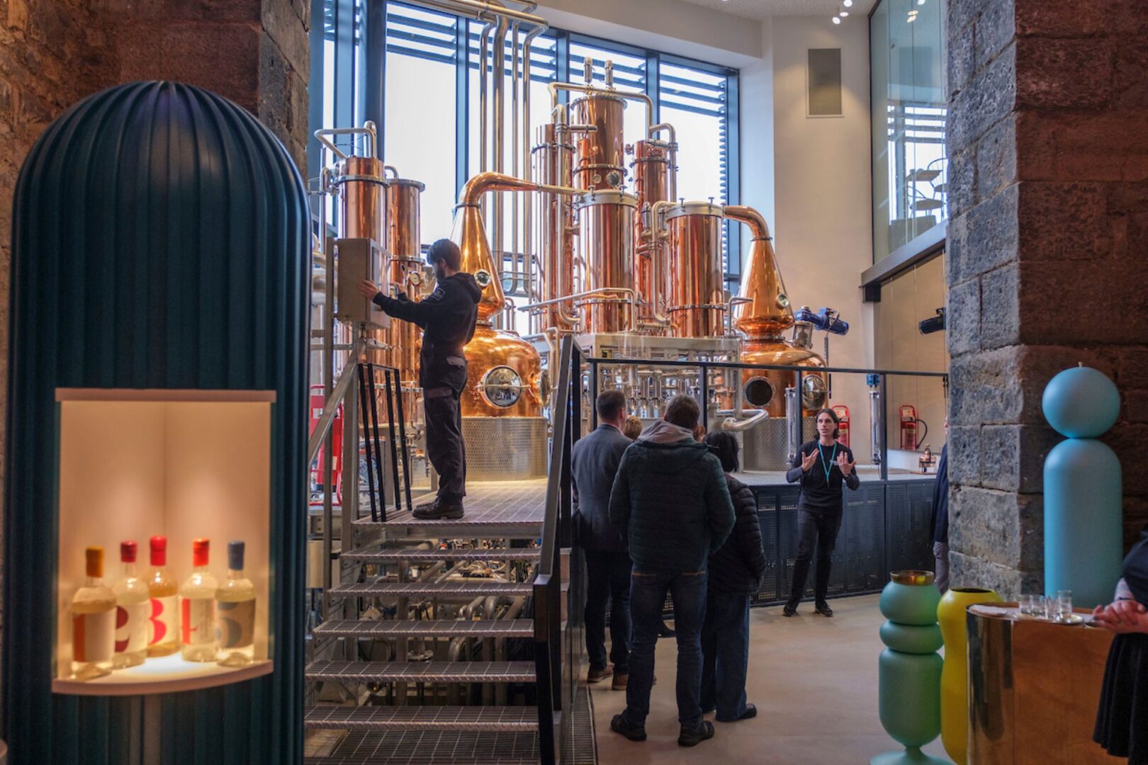 A tour group being shown a Gin Still at Edinburgh Gin