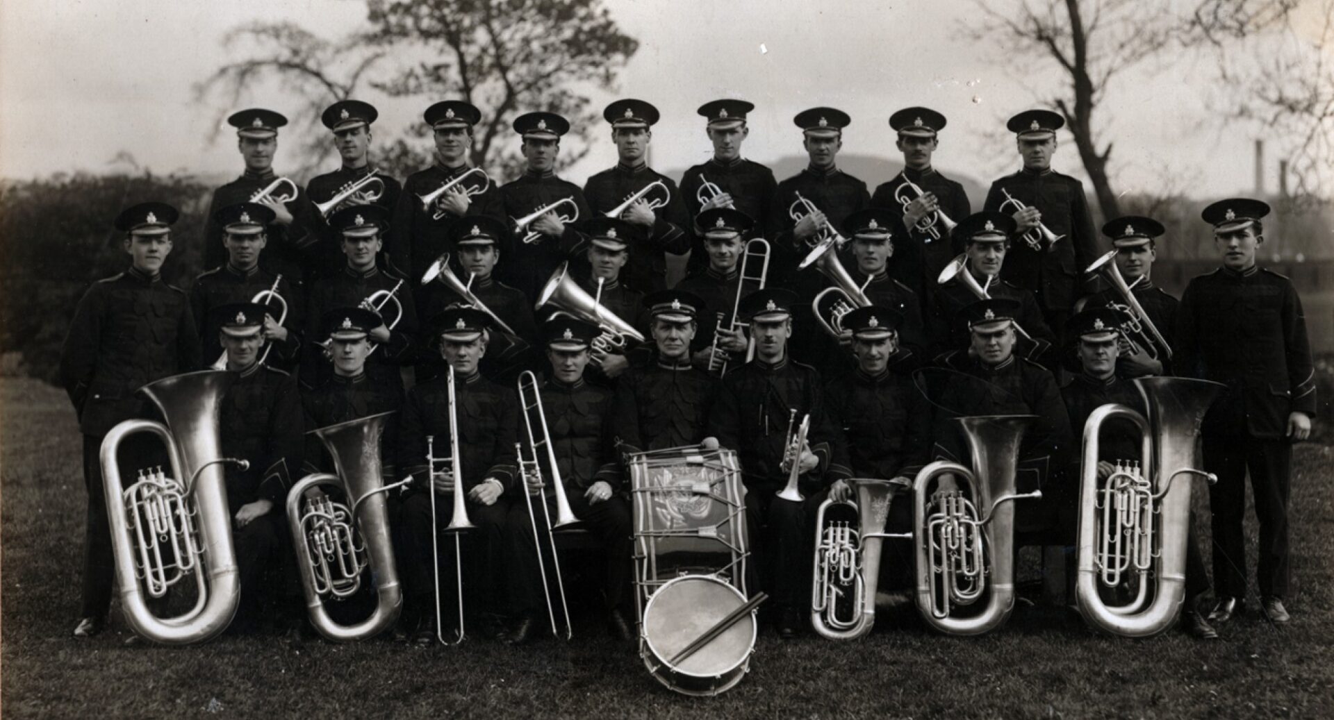 City of Edinburgh band in uniform, with trumpets, tubas, trombones and drums, 1920s