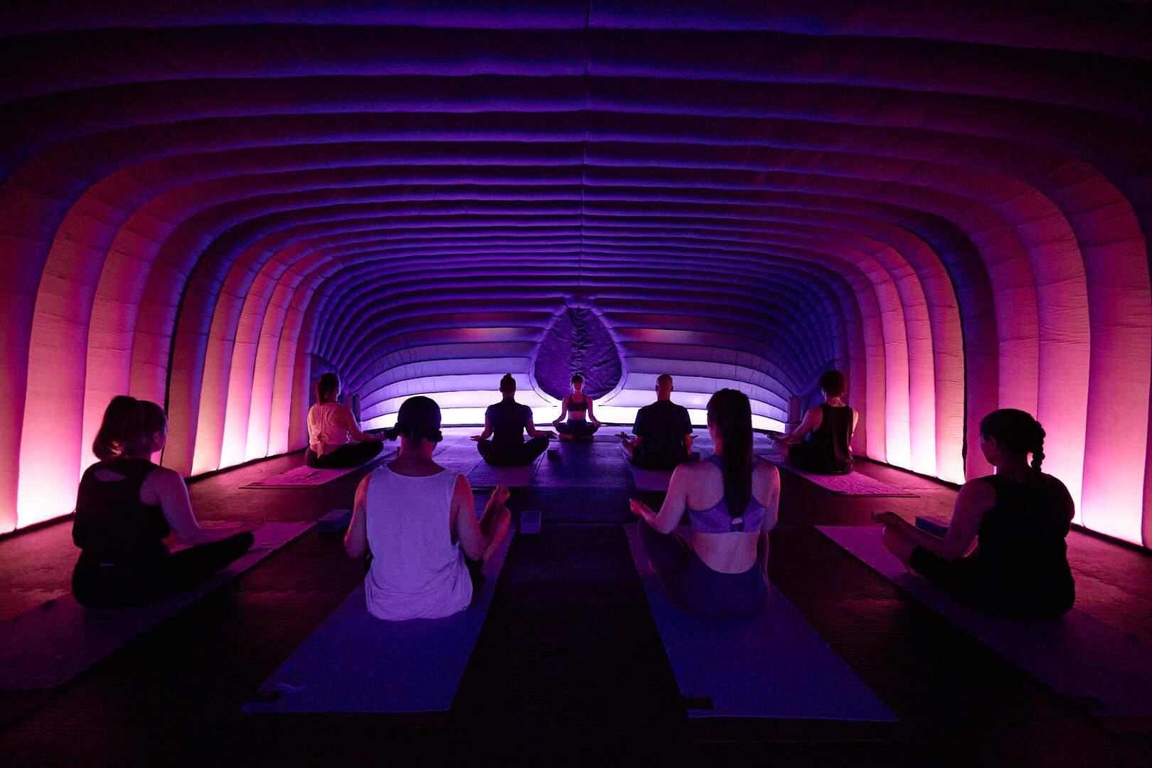 People taking part in Hotpod Yoga