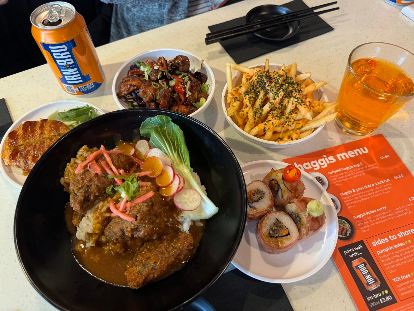 Haggis Dishes and sides on table at Yo!