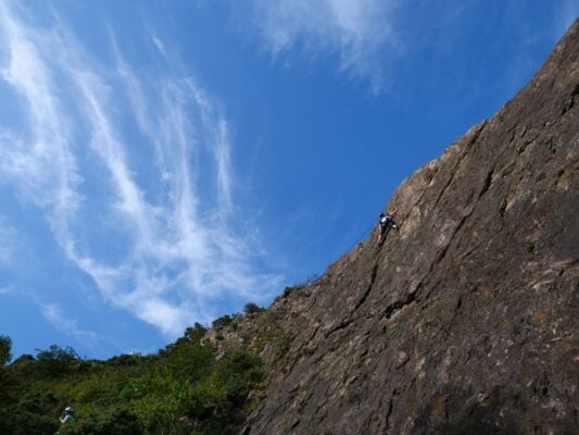 Indoor climber flying high outdoors. Big sky. Edinburgh city,© Height Club