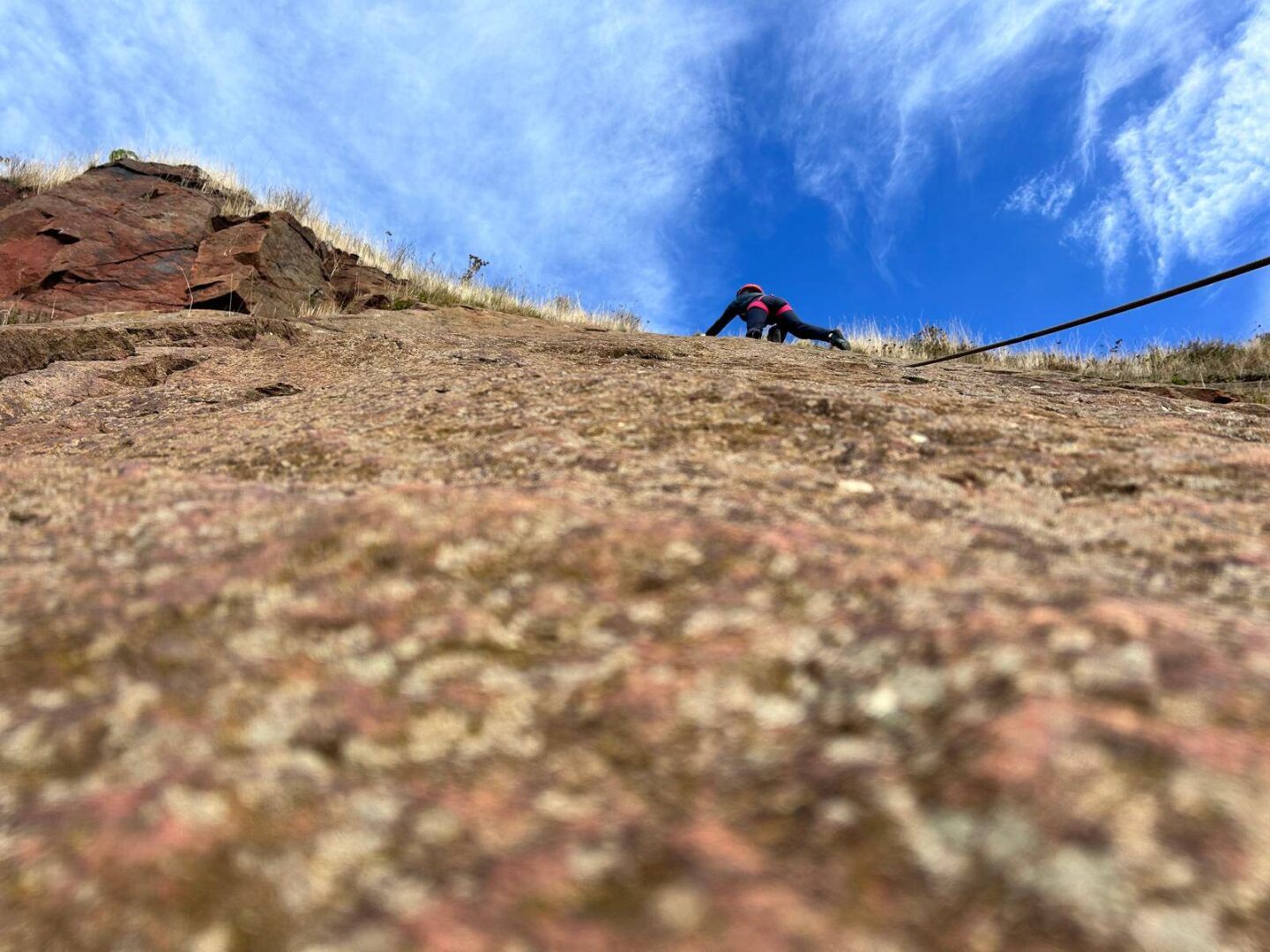 This could be you. Climber high up on Westy Slab, north Berwick,© Height Club