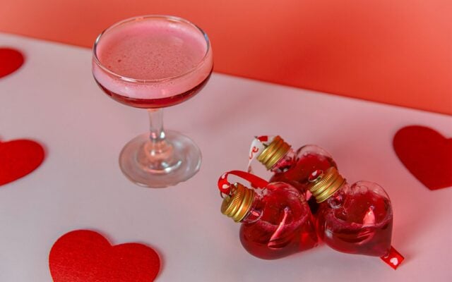 Valentines Cocktail next to Gin Heart Baubles