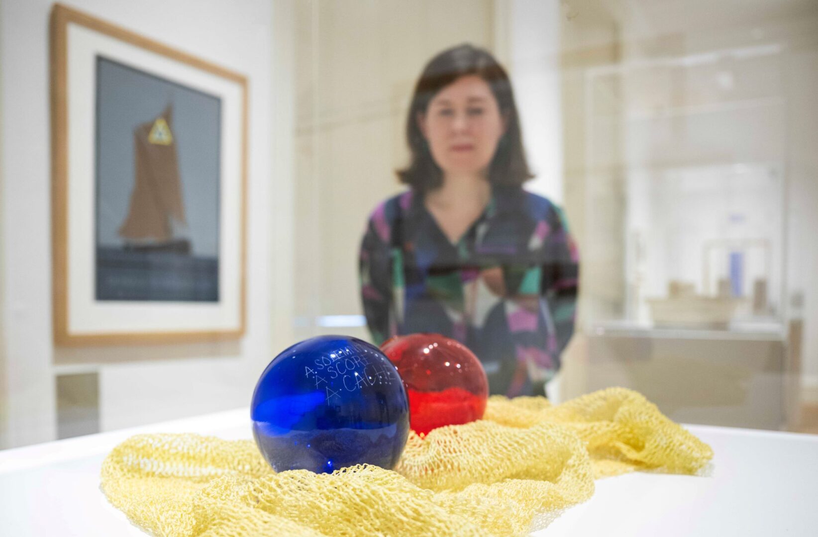 Lady looking at Ian Hamilton Finlay artwork