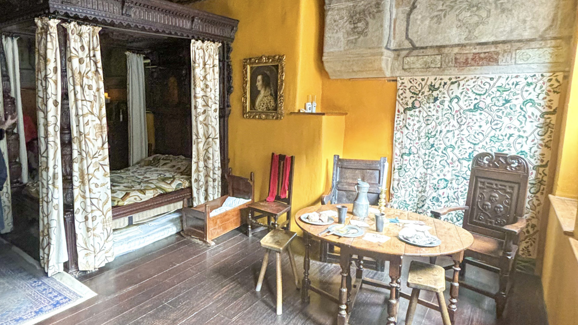 Four poster bed in bedroom of Gladstones Land