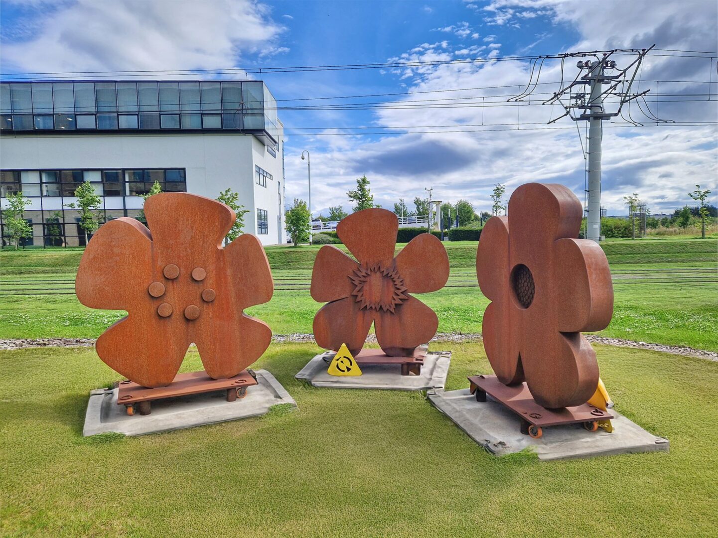 3 large-scale flower sculptures.