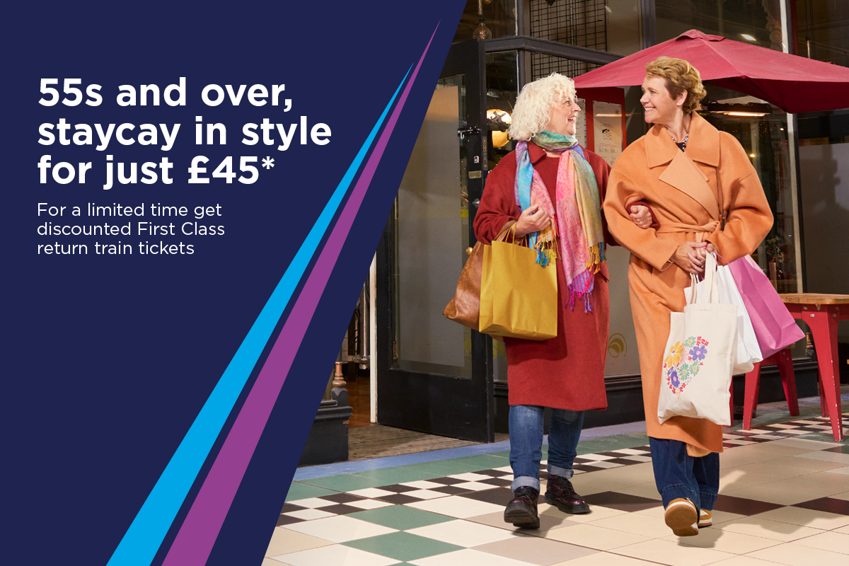 Transpennine Express poster with 2 women holding shopping bags