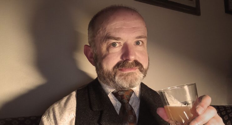 Mark Kydd drinking a pint