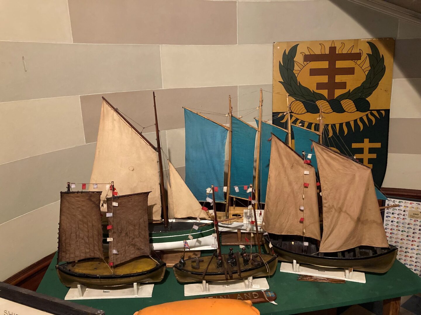 Collection of old model sailing ships.