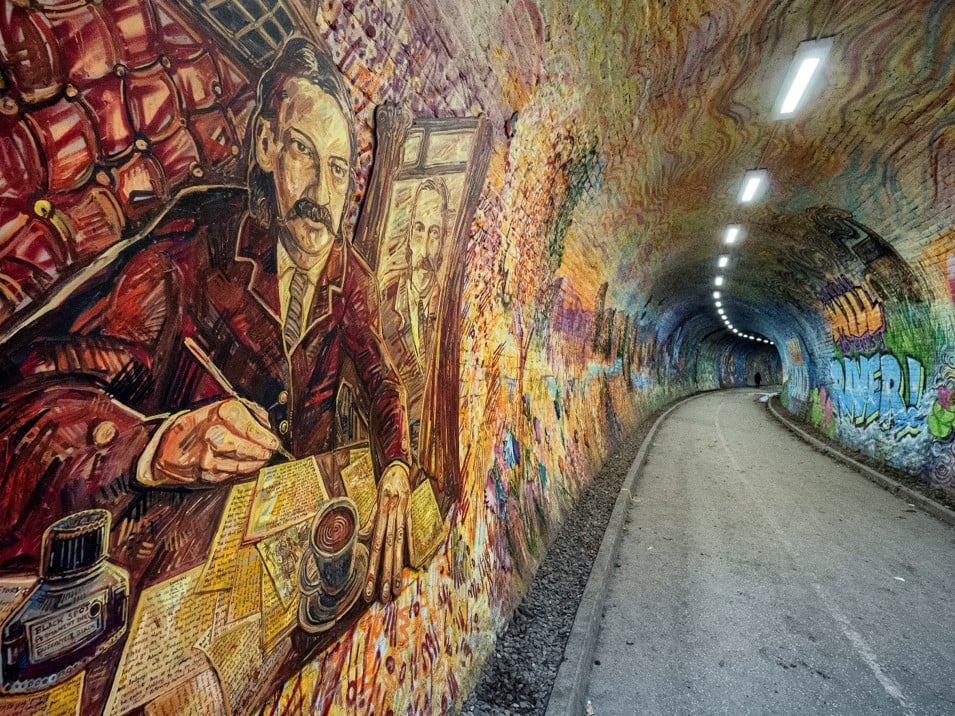 The Colinton Tunnel mural, showing an image of Robert Louis Stevenson and the overhead lights