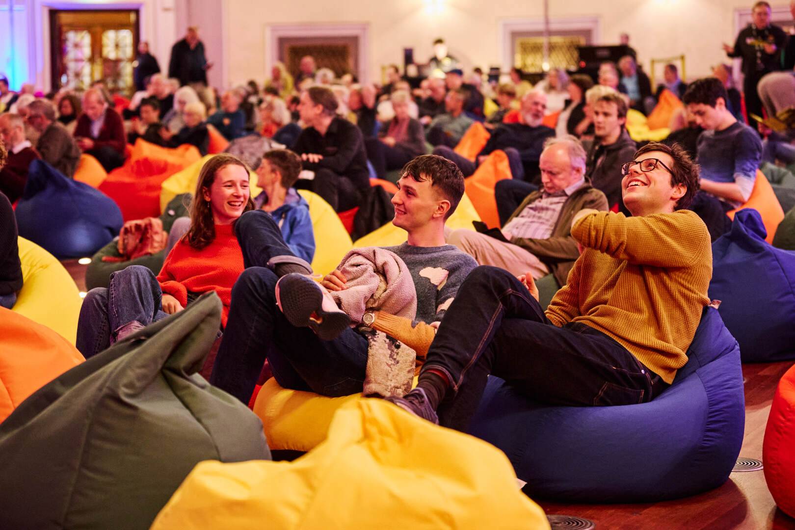 People sitting in a hall on bean bags watching the Edinburgh Festival Chorus,© Andrew Perry