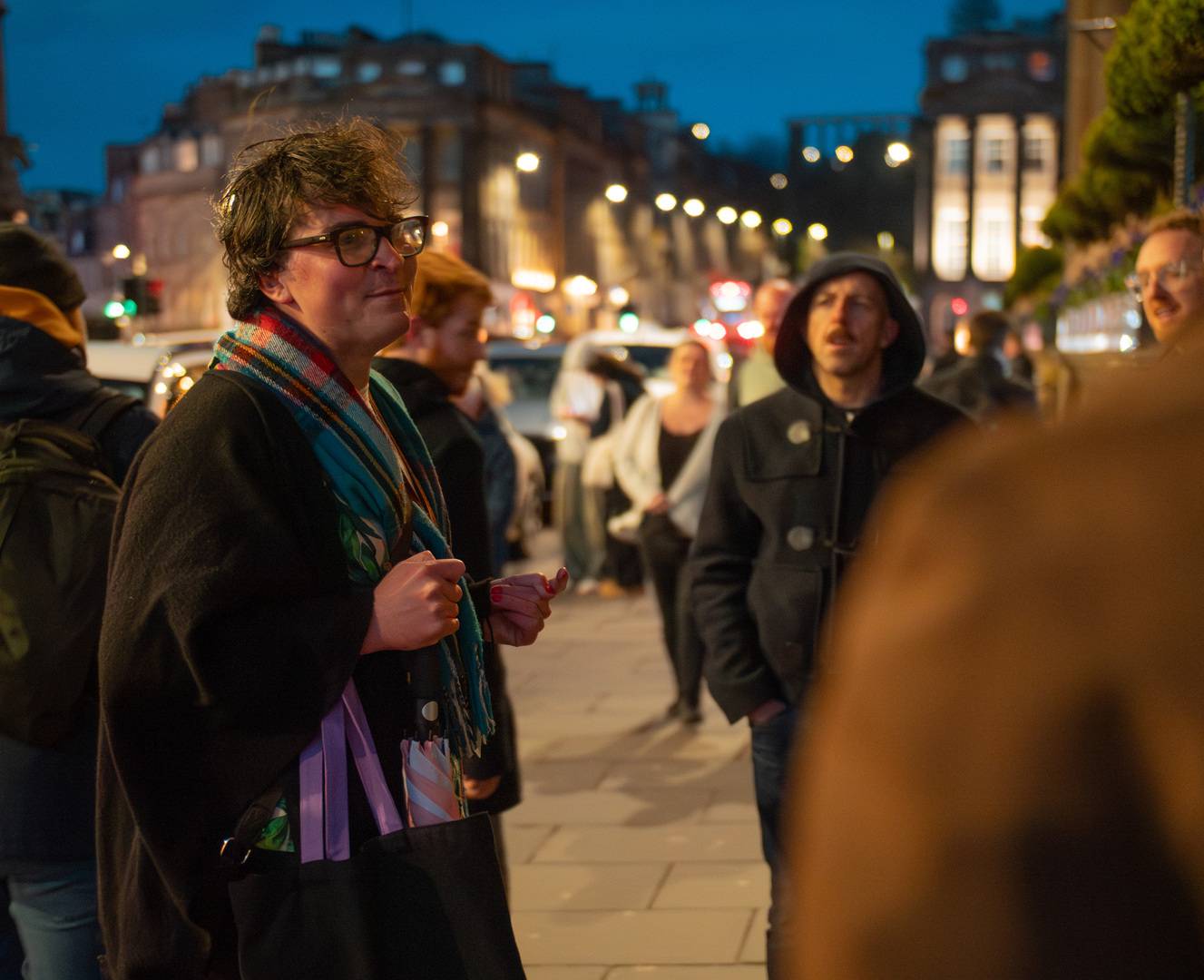The tour guide talking to his group