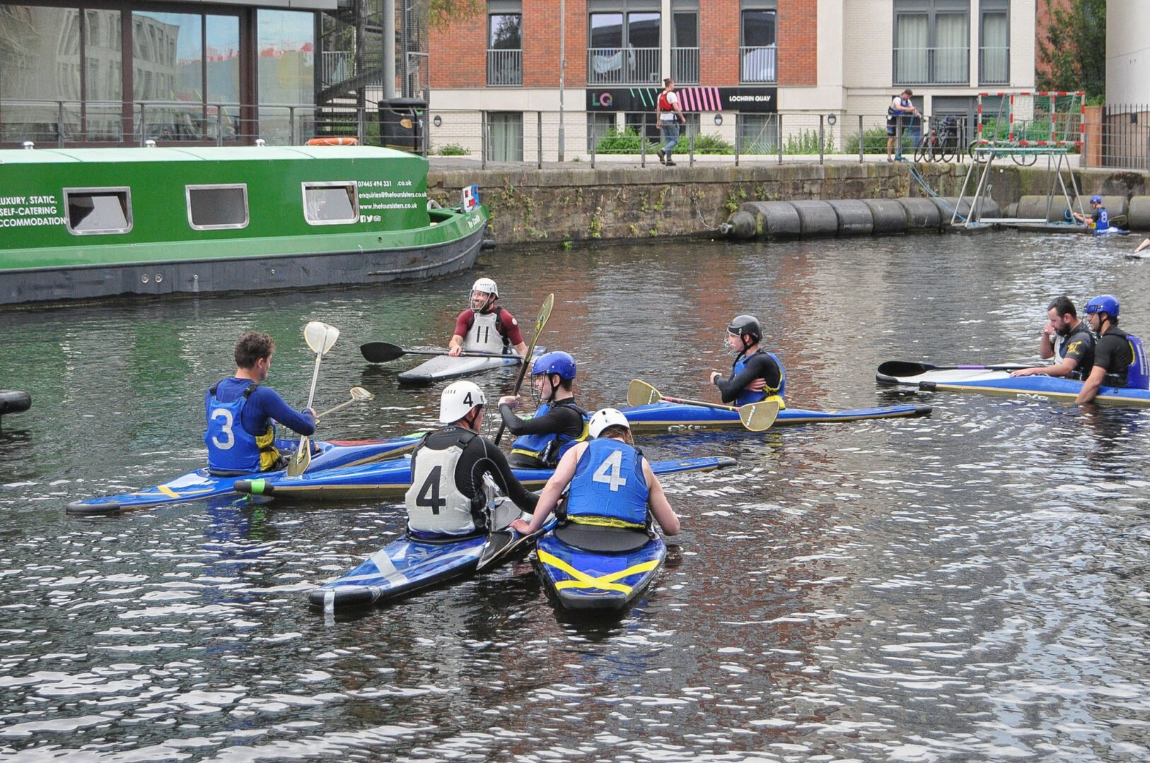 A group of people in canoes