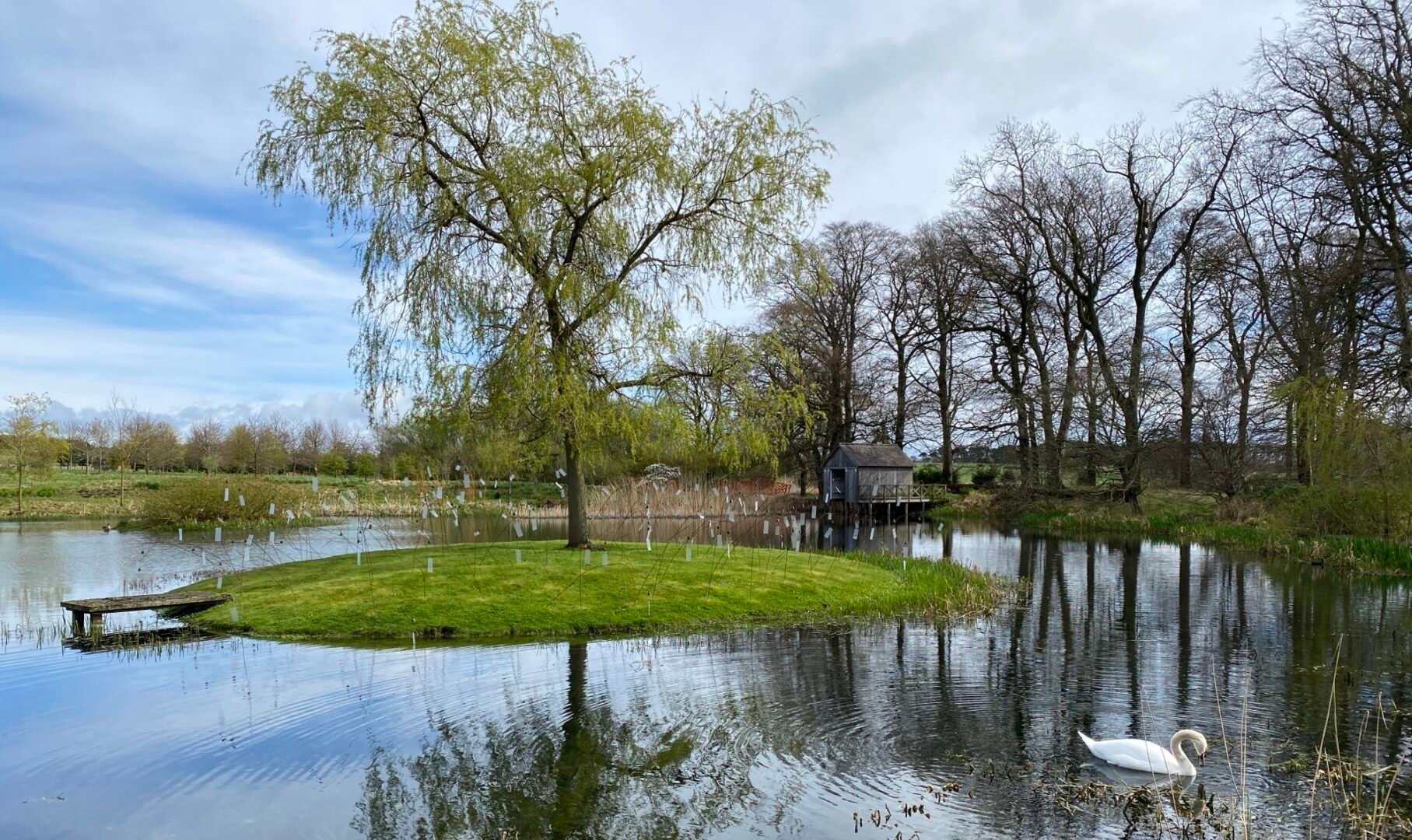 Animitas is a sound installation comprising hundreds of small bells that chime in the wind. Surrounded by water at Jupiter Artland