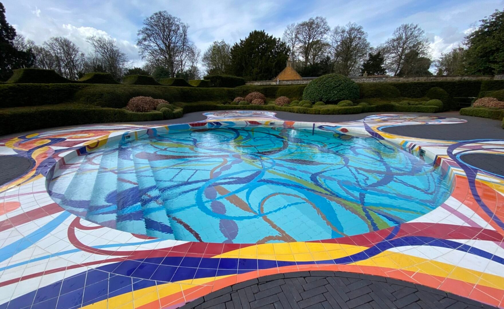 Gateway by Joana Vasconcelos is a sculpted swimming pool adorned with 11,500 handcrafted Portuguese tiles.