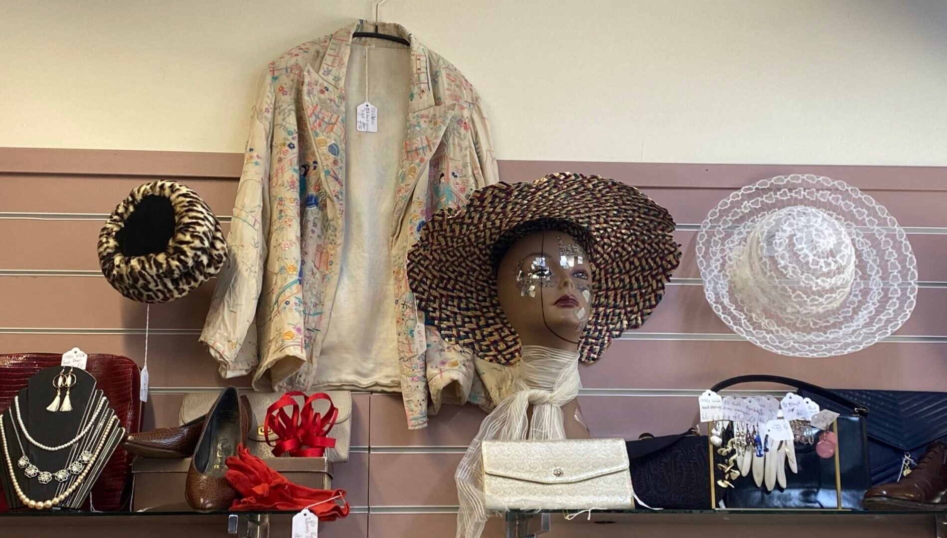 Vintage hats and jacket on display at Carnivale
