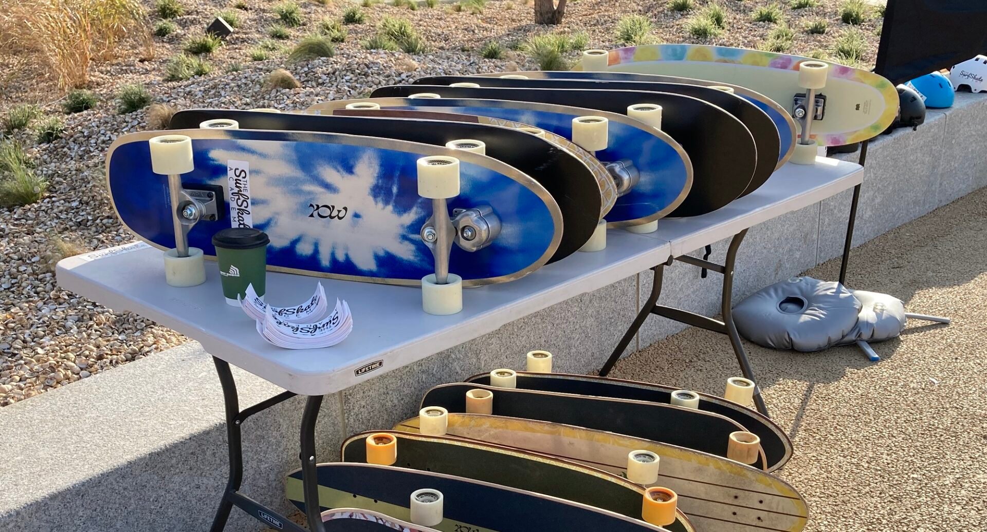 a line of skate boards ready for SurfSkate lessons at Lost Shore Resort