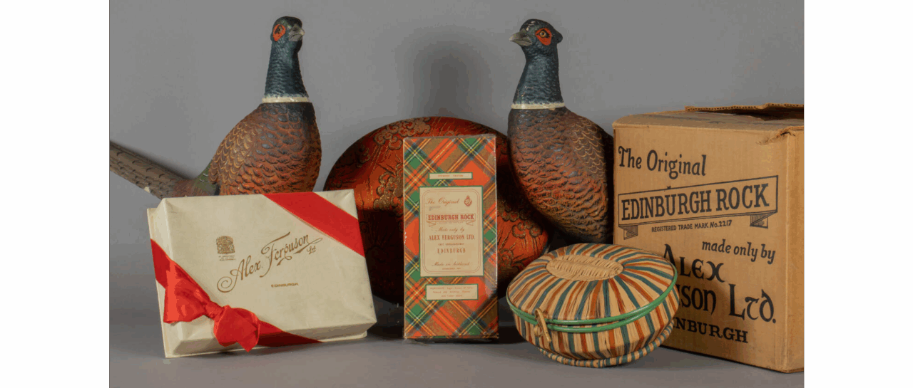 Two ornamental grouse and a selection of boxes of Alex Ferguson Edinburgh rock