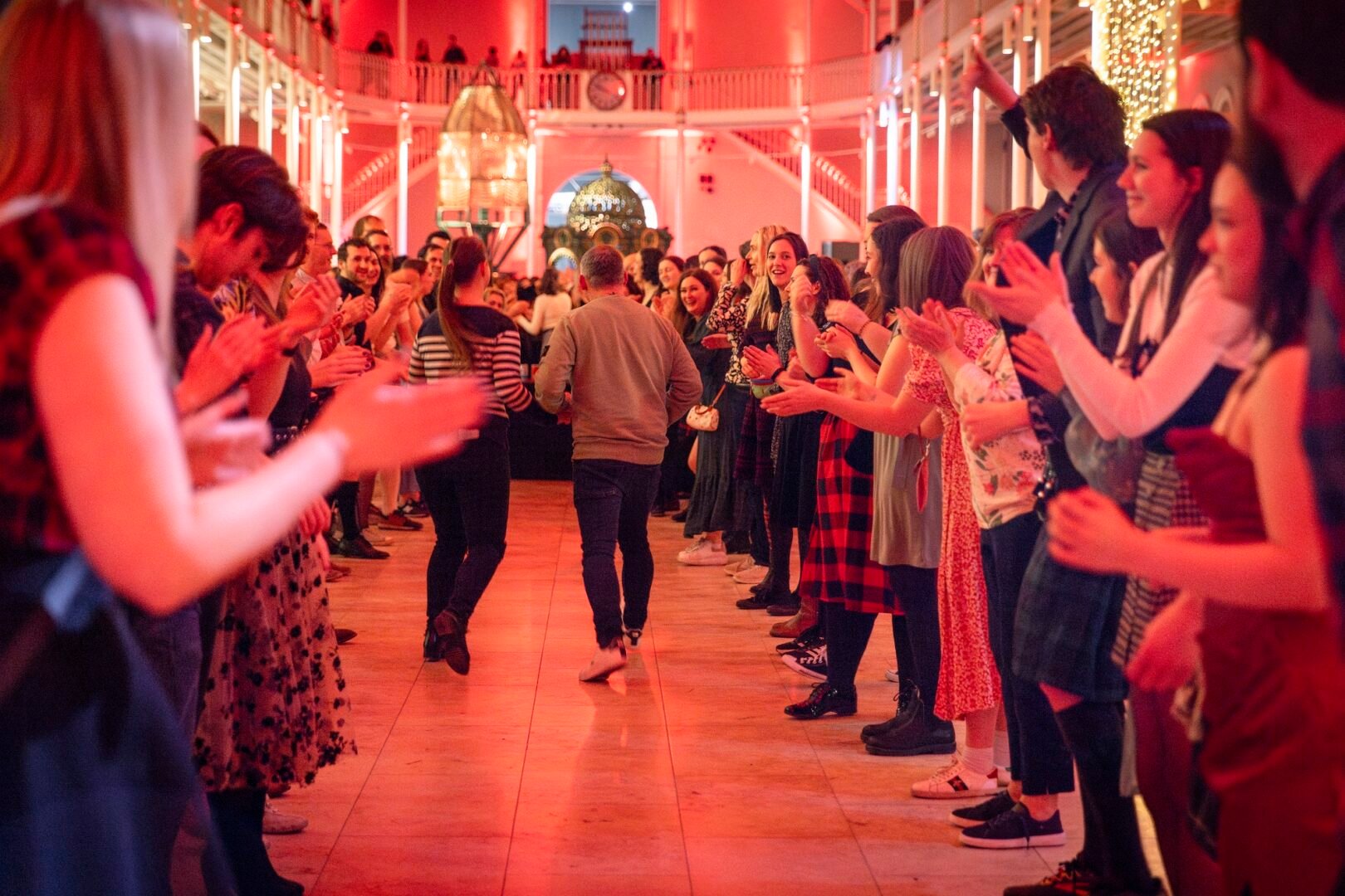 People ceilidh dancing