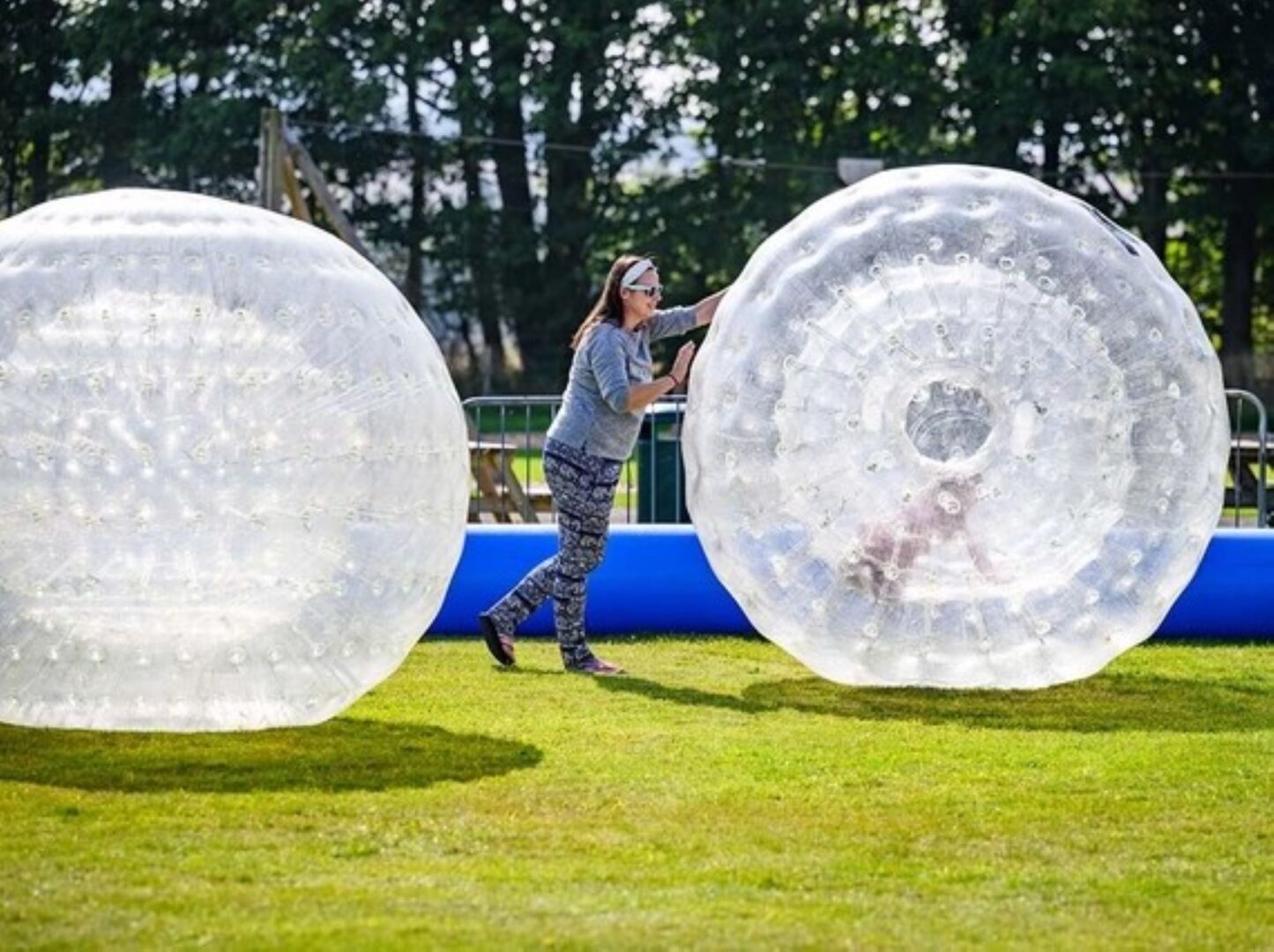 Person being pushed in a zorb ball