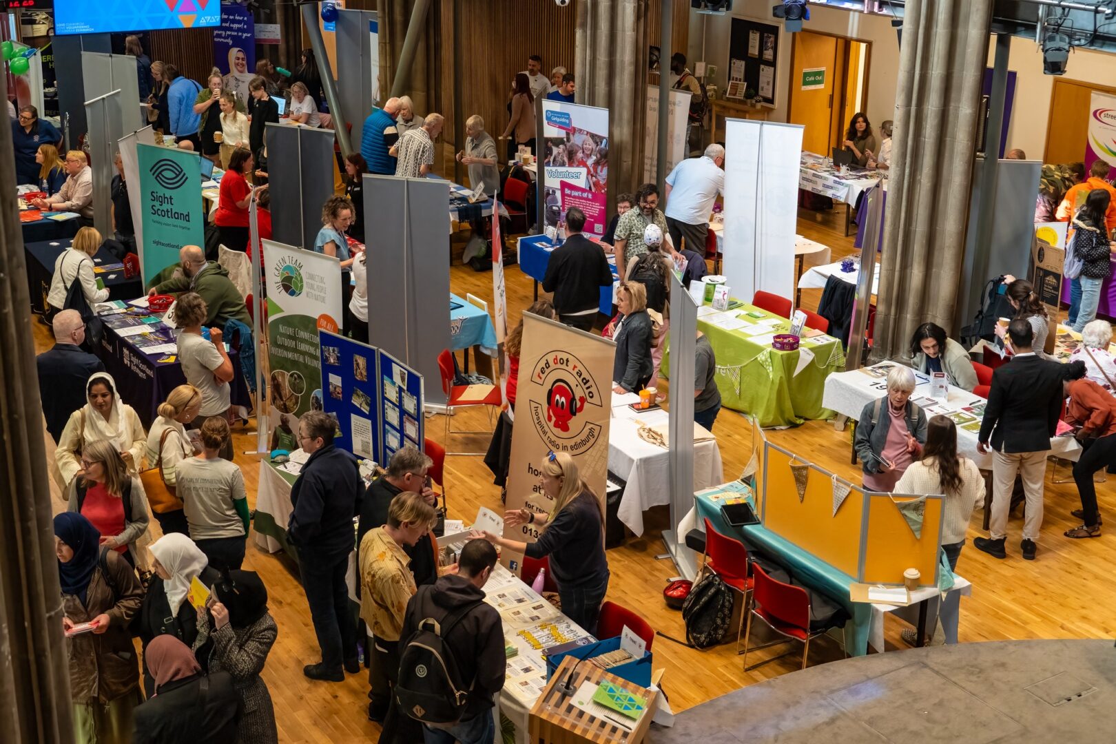 A high up shot of crowds at a Volunteer Edinburgh recruitment fair