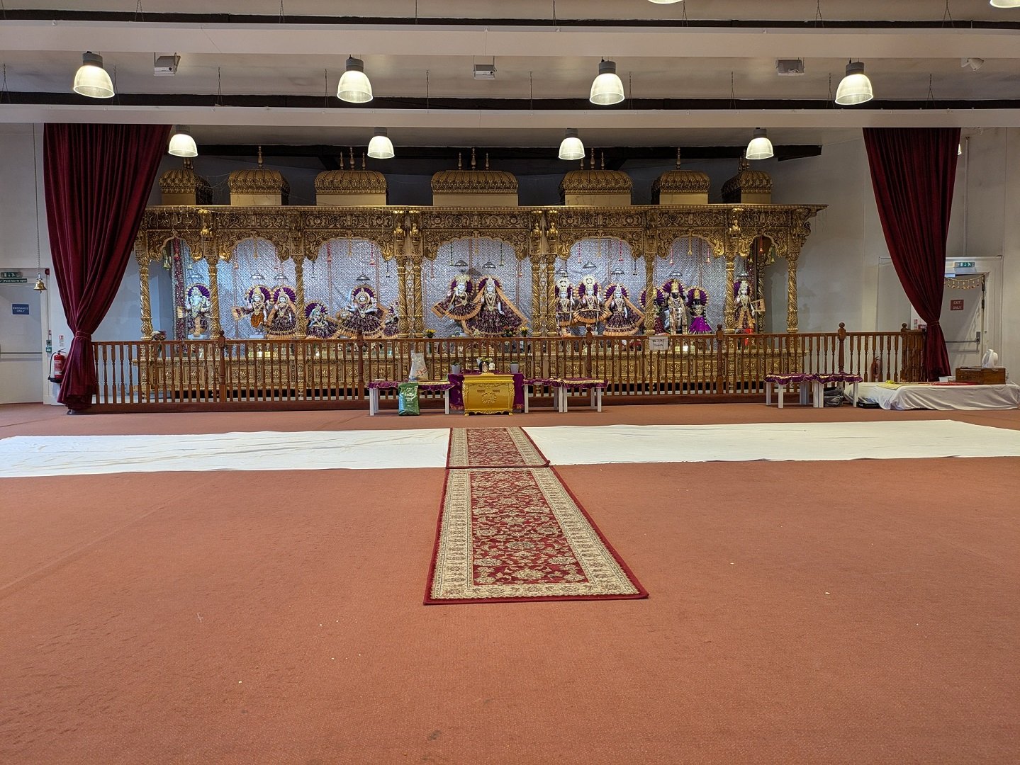 Shrine at Edinburgh Hindu Mandir and Cultural Centre with Murtis statues of deities or goddess.