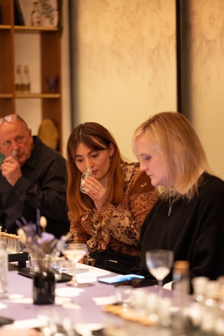 Edinburgh Gin Aroma Alchemy tasting with guests smelling test tubes.