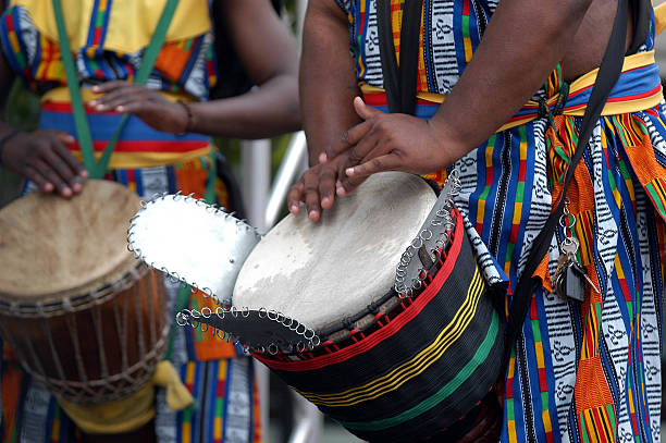 A close up of an African drum being played