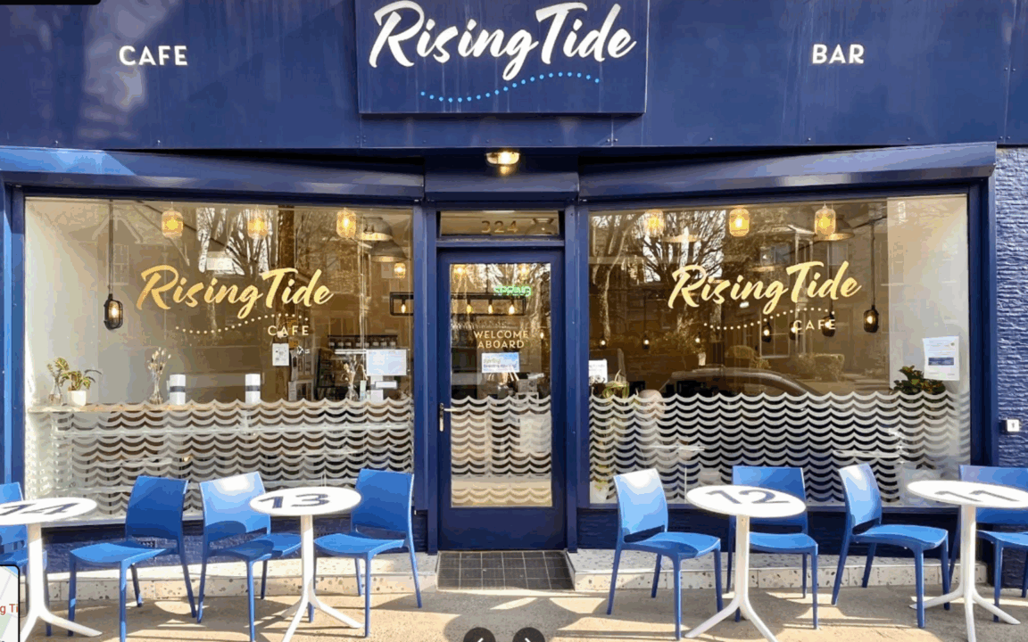 Image of outside of Rising Tide Cafe, Portobello, Edinburgh, showing outside tables and chairs,© Rising Tide Cafe Limited