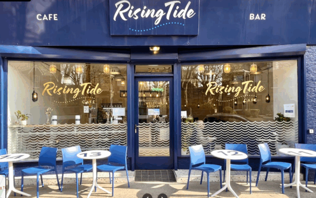 Image of outside of Rising Tide Cafe, Portobello, Edinburgh, showing outside tables and chairs,© Rising Tide Cafe Limited