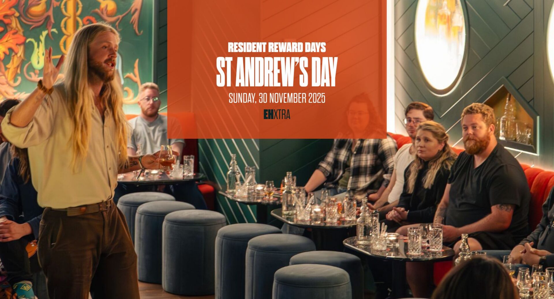 Orange box with words saying Rsidetn Reward Days St Andrews Day. Image behind is of tour guide doing whisky tasting with tour group.