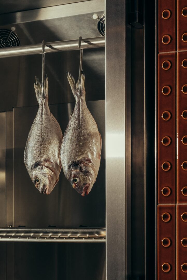 Fish hanging in Lyla restaurant kitchen
