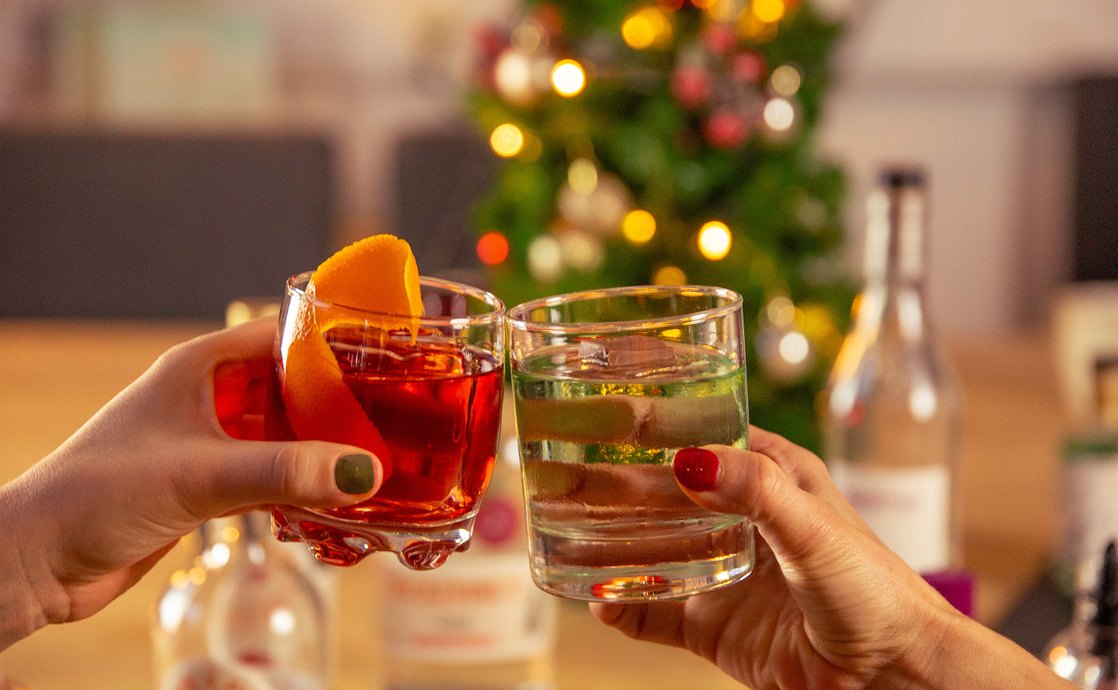 Two glasses being cheered together from Pickerings Gin bauble workshop