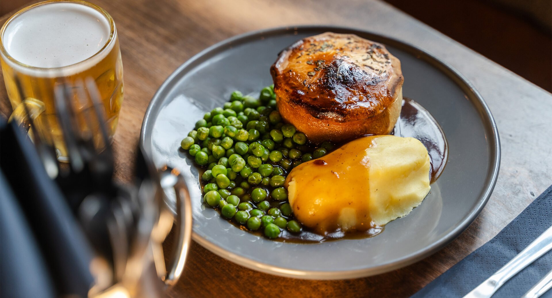 Pie, mash, peas and a pint at John's Coffee House and Tavern