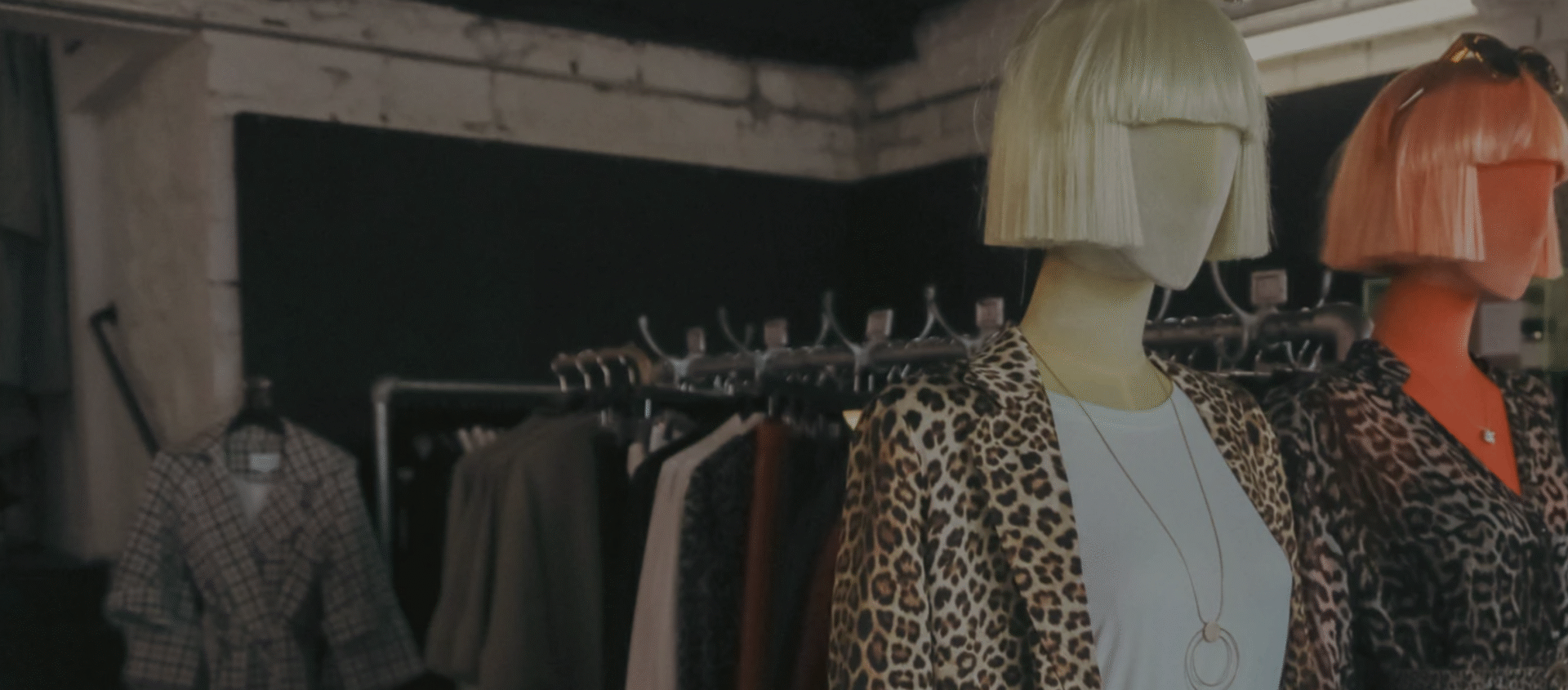 colourful mannequins with clothes in the background,© Joyce Paton