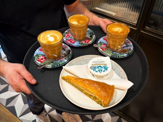Fresh coffee paired with baklava, served with rich clotted cream — simple, indulgent, and comforting.