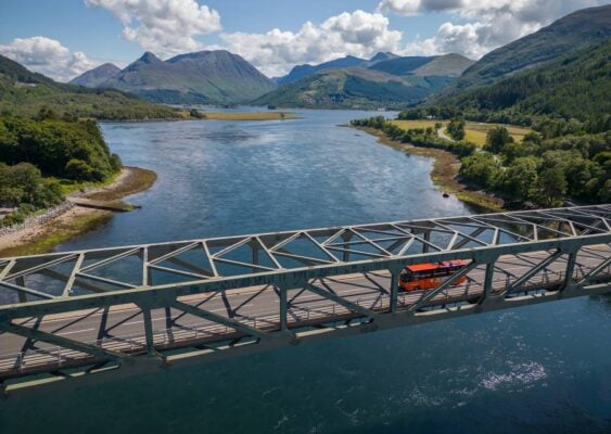 Bus going over bridge in Scottish Highands