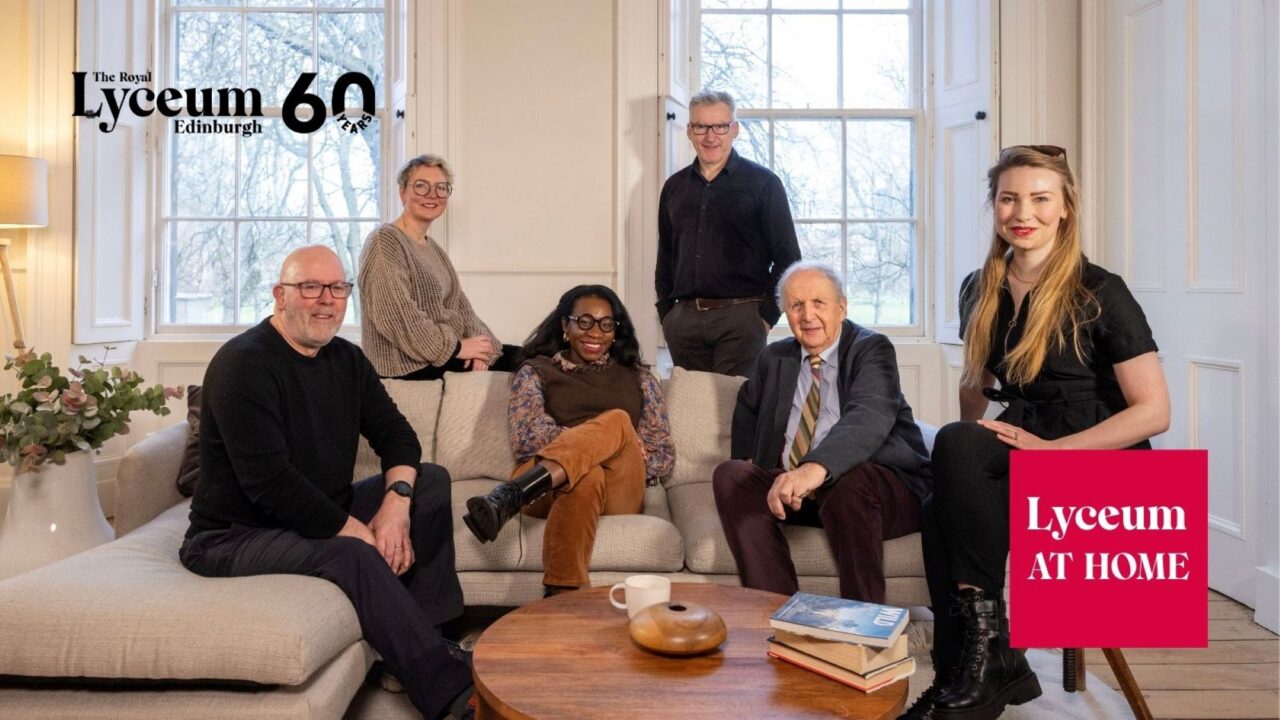 Group of people seated in a lounge area.