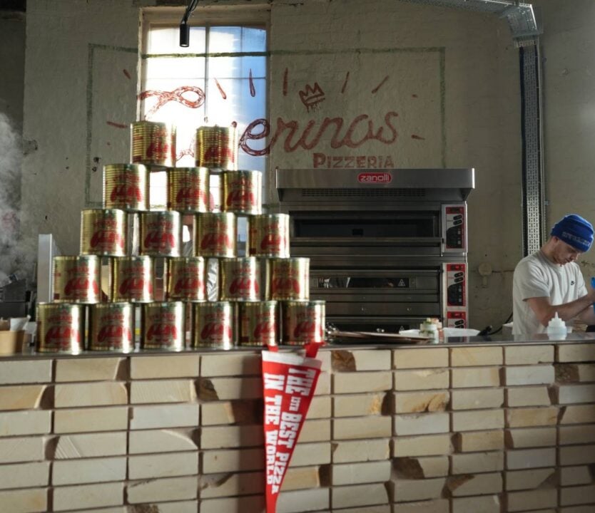 Stack of cans on counter in front of Civerinos pizza oven,© Civerinos