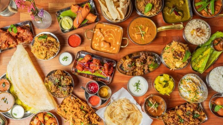 Many food dishes plated on a table from Tamil Teru  menu,© Edinburgh Diner Ltd