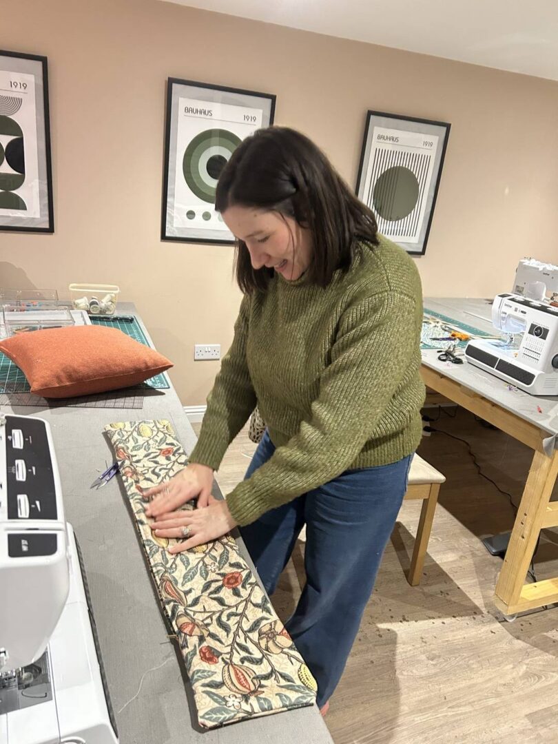 lady sewing during Joppa Sewing School class