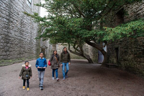 Family visiting Craigmillar Castle.